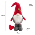 Gnomo di Natale rosso con cuore luminoso e gambe telescopiche su sfondo bianco - Stile Maschile Senza Volto