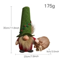 Christmas gnome plush with tall green spiral hat holding a burlap sack, 30cm height - Green Top Hat Faceless Doll