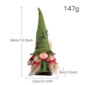 Gnome de Noël avec chapeau vert à spirale et nattes dorées, dimensions de 34cm de haut - Nain Chapeau Pointu Vert