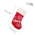 Calcetín navideño de punto rojo con copo de nieve blanco y texto Joy para decoro festivo - Estilo JOY
