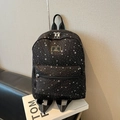 Black canvas backpack with white star pattern and large capacity for school students - Black