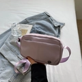 Casual lavender nylon crossbody bag with wide shoulder strap and metal logo detail - Purple