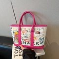 White canvas tote with pink leather trim and colorful graffiti bear shark patterns - Pink