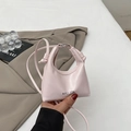 Minimalist light pink PU leather handbag with decorative knot handle and thin strap - Pink