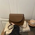 Brown vintage semi-circle flap crossbody bag with embossed Fashion Bags text - Brown