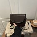 Classic dark brown saddle crossbody bag in faux leather with adjustable shoulder strap - Brown