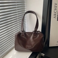Dark brown faux leather Boston bag with polished surface and metallic brand plaque - Brown