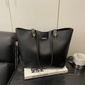Minimalist black PU leather tote bag with elegant gold hardware for urban office commute - Black