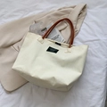 Sac fourre-tout en toile blanc cassé avec poignées en cuir marron et étiquette carrée - Beige