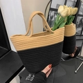 Minimalistische geweven emmer handtas met kaki en zwart tweekleurig patchwork design - Zwart