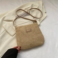 Vintage woven beige straw tote bag with brown leather strap and brand logo detail - Khaki