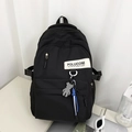 Schwarzer Mehrzweck-Schulrucksack mit Schachbrett-Bär-Anhänger und Marken-Patch - Mit Anhänger / Schwarz