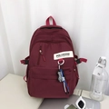 Minimalistischer burgunderroter Nylon Rucksack für Studenten mit kariertem Anhänger - Mit Anhänger / Burgunderrot