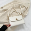 Minimalist vintage white square crossbody bag with a golden metal twist lock and top handle - White