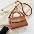 Brown vintage faux leather crossbody bag with golden rotary lock and slim strap - Tan