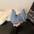 Damen Umhängetasche aus hellblauem Denim mit silbernem Schmetterling und Webgriff - Blau