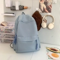 Zaino azzurro minimalista per studenti di grande capacità con tirazip intrecciati - Blu