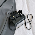 Fashion black patent leather handbag with gold buckle and fluffy fur ball charm - With Pendant / Black