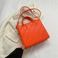 Minimalist square orange tote bag with diagonal texture and gold floral buckle - Orange