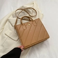 Chic camel brown quilted handbag with golden flower buckle and adjustable shoulder strap - Khaki