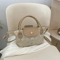 Minimalistische beige Webhandtasche mit rosa Blumenstickerei und Ledergriffen - Khaki