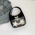 Borsa tote in tela nera con tasca in PVC a stella e ciondoli con palline di peluche - Nero