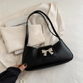 Chic black PU leather underarm bag with silver metal bow decoration and slim strap - Black