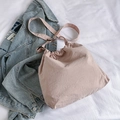 Minimalist light pink drawstring crossbody bucket bag with adjustable shoulder strap - Pink