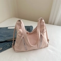 Stijlvolle lichtroze schoudertas met strikdetail en decoratieve ritsen voor dames - Roze