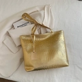 Chic gold crocodile embossed tote bag for women featuring a glossy metallic PU leather finish - Gold