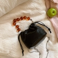 Sac seau noir chic à cordon avec poignée en perles d'ambre et chaîne en argent - Noir