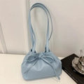 Chic light blue dumpling bucket bag with drawstring bow detail and sleek PU leather texture - Blue