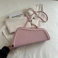 Minimalist light pink curved shoulder bag with gold lettering and slim leather strap - Pink
