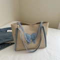 Minimalist straw tote bag in beige with light blue butterfly faux leather trim details - Blue
