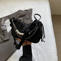 Fashionable black textured crescent bag with pearl chain and metallic details - Black