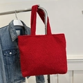 Red plush tote bag with cozy fleece texture and matching shoulder strap for women - Red