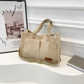 Sac fourre-tout minimaliste en velours côtelé beige avec doubles poches et bandoulière - Kaki