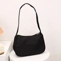Minimalist black crescent canvas underarm bag with smooth zipper and sleek shoulder strap - Black