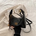 Elegant black crescent shoulder bag in smooth faux leather with gold accents - With Pendant / Black