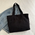Minimalist black corduroy tote bag with double front pockets for daily casual use - Black