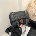 Quilted black leather shoulder bag with vintage gold chain and bear buckle detail - Black