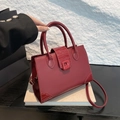 Deep red crocodile embossed faux leather tote bag with top handles and shoulder strap - Red