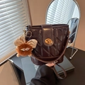 Deep brown quilted bucket bag with golden lock and cute plush monster pendant - With Plush Monster Charm / Dark Coffee