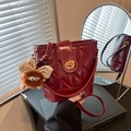 Burgundy quilted bucket bag with diamond stitching and luxury gold buckle hardware - With Plush Monster Charm / Burgundy