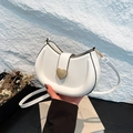 Chic white crescent shoulder bag featuring a gold heart clasp and premium PU leather finish - White