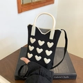 Sac à téléphone tricoté noir avec motifs cœurs 3D blancs et bandoulière - Noir