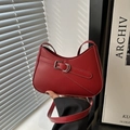 Chic red crescent handbag for women featuring silver buckle and stylish asymmetric design - Red
