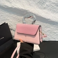 Pink crossbody bag with woven texture lid and modern silver metallic top handle - Pink