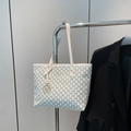 Chic beige tote bag with all-over M monogram pattern and gold metal letter charm - White