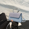 Light blue contrast crossbody bag with silver metallic handle and textured flap - Blue